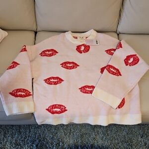 Fantastic Fawn Blush Sweater with Lip Motifs